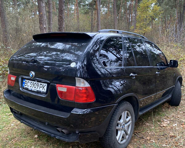 Черный БМВ Х5, объемом двигателя 4.4 л и пробегом 360 тыс. км за 11800 $, фото 7 на Automoto.ua