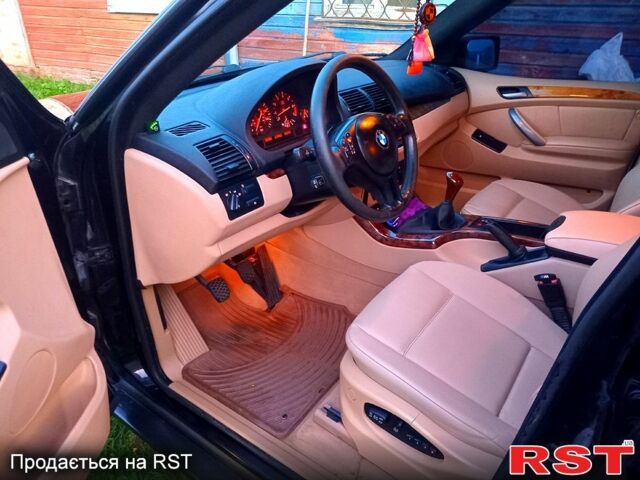 Чорний БМВ Х5, об'ємом двигуна 3 л та пробігом 350 тис. км за 9000 $, фото 5 на Automoto.ua