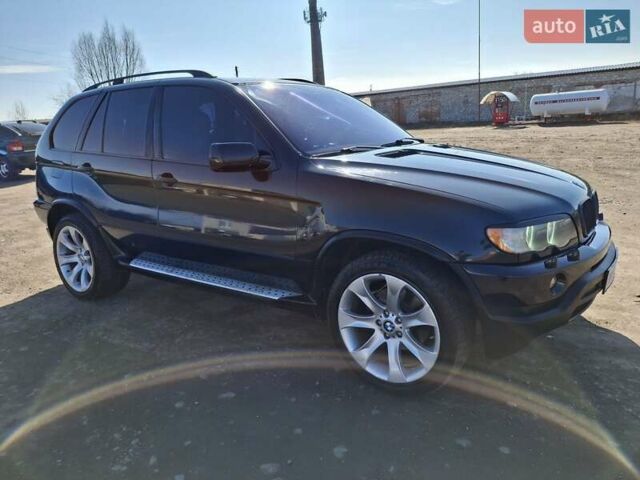 Черный БМВ Х5, объемом двигателя 4.4 л и пробегом 314 тыс. км за 8000 $, фото 26 на Automoto.ua