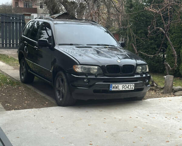 Черный БМВ Х5, объемом двигателя 3 л и пробегом 300 тыс. км за 3950 $, фото 3 на Automoto.ua