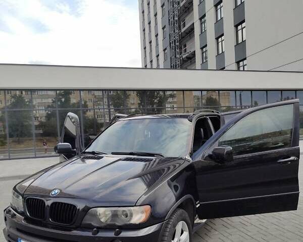 Черный БМВ Х5, объемом двигателя 4.4 л и пробегом 444 тыс. км за 7700 $, фото 6 на Automoto.ua