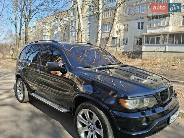 Черный БМВ Х5, объемом двигателя 4.4 л и пробегом 314 тыс. км за 8000 $, фото 4 на Automoto.ua
