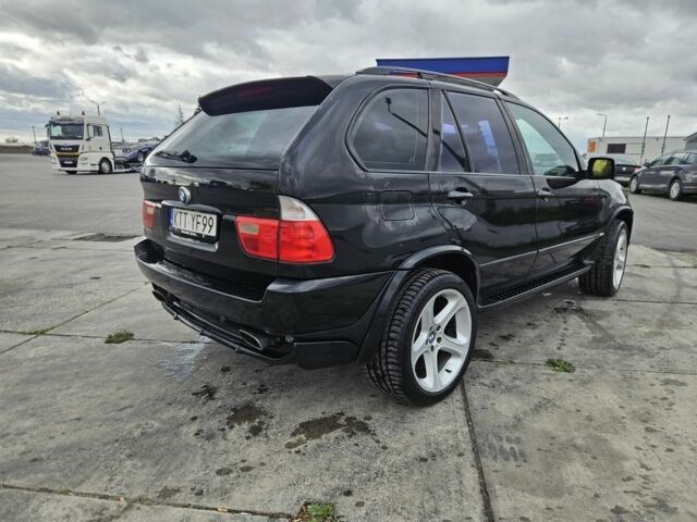 Черный БМВ Х5, объемом двигателя 4.6 л и пробегом 326 тыс. км за 2600 $, фото 6 на Automoto.ua