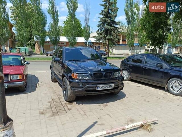 Черный БМВ Х5, объемом двигателя 4.4 л и пробегом 280 тыс. км за 14500 $, фото 1 на Automoto.ua