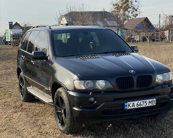Черный БМВ Х5, объемом двигателя 3 л и пробегом 330 тыс. км за 9000 $, фото 1 на Automoto.ua
