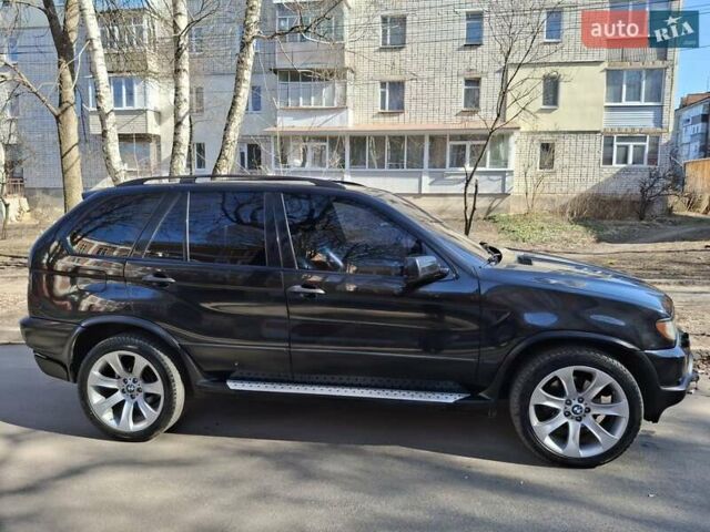 Черный БМВ Х5, объемом двигателя 4.4 л и пробегом 314 тыс. км за 8000 $, фото 3 на Automoto.ua