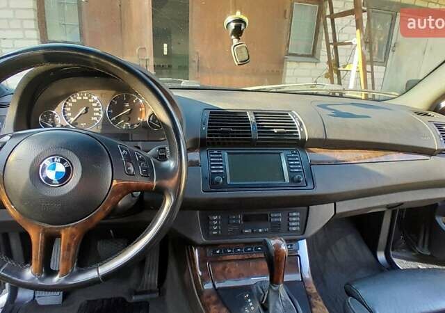 Черный БМВ Х5, объемом двигателя 3 л и пробегом 302 тыс. км за 9200 $, фото 28 на Automoto.ua