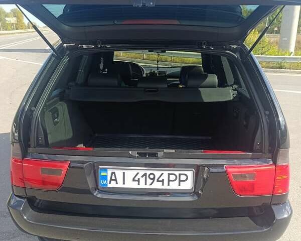 Чорний БМВ Х5, об'ємом двигуна 3 л та пробігом 327 тис. км за 9500 $, фото 5 на Automoto.ua