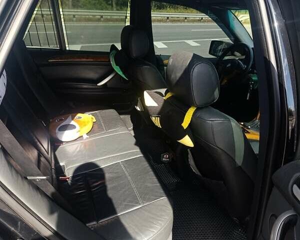 Чорний БМВ Х5, об'ємом двигуна 3 л та пробігом 327 тис. км за 9500 $, фото 10 на Automoto.ua