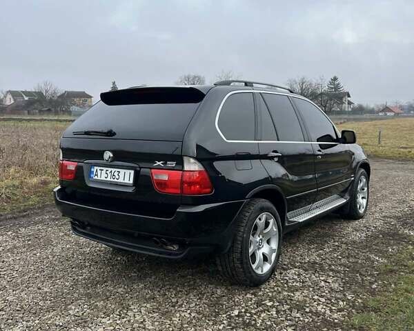 Черный БМВ Х5, объемом двигателя 4.4 л и пробегом 350 тыс. км за 6700 $, фото 5 на Automoto.ua