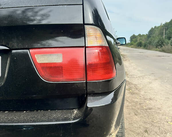 Черный БМВ Х5, объемом двигателя 3 л и пробегом 412 тыс. км за 7500 $, фото 7 на Automoto.ua