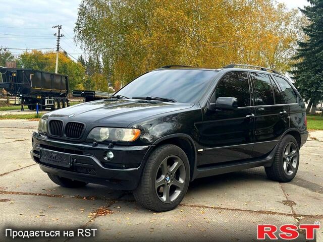 Черный БМВ Х5, объемом двигателя 3 л и пробегом 400 тыс. км за 6000 $, фото 1 на Automoto.ua