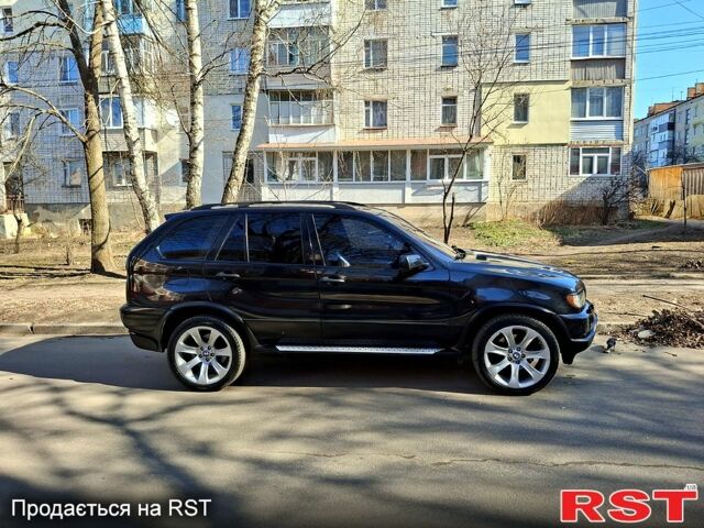 Черный БМВ Х5, объемом двигателя 4.4 л и пробегом 314 тыс. км за 8000 $, фото 11 на Automoto.ua