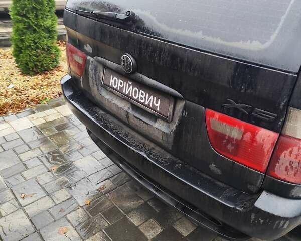 Чорний БМВ Х5, об'ємом двигуна 3 л та пробігом 400 тис. км за 7400 $, фото 4 на Automoto.ua