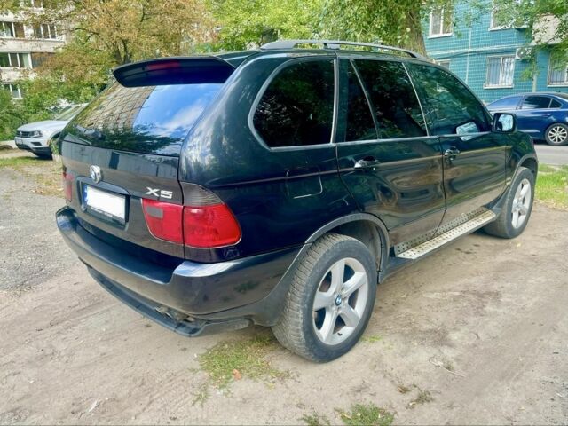 Чорний БМВ Х5, об'ємом двигуна 4.4 л та пробігом 400 тис. км за 10020 $, фото 3 на Automoto.ua