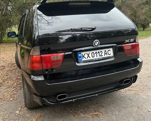 Чорний БМВ Х5, об'ємом двигуна 3 л та пробігом 350 тис. км за 9000 $, фото 4 на Automoto.ua