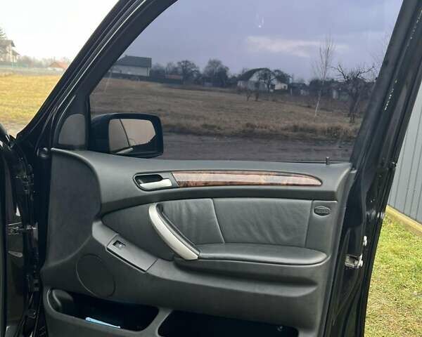 Черный БМВ Х5, объемом двигателя 4.4 л и пробегом 350 тыс. км за 6700 $, фото 15 на Automoto.ua