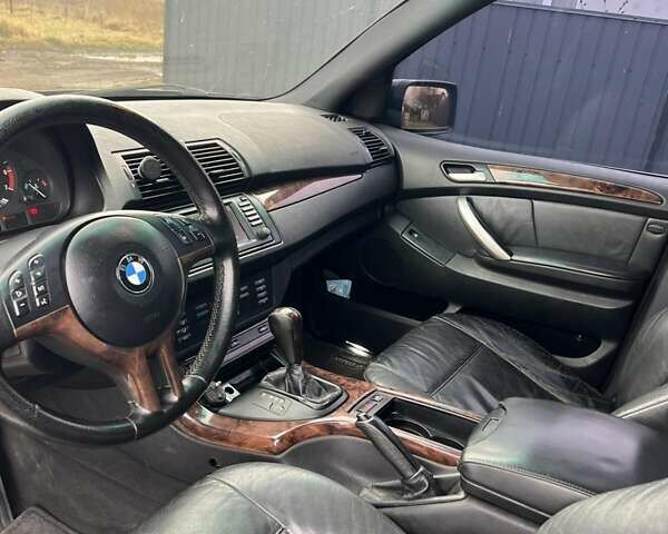 Черный БМВ Х5, объемом двигателя 4.4 л и пробегом 350 тыс. км за 6700 $, фото 9 на Automoto.ua