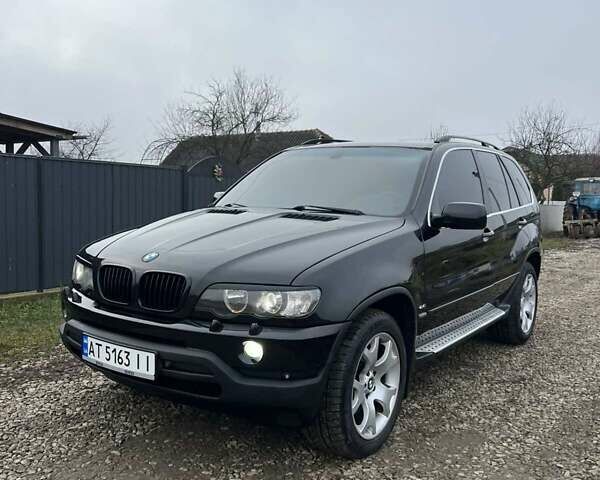 Черный БМВ Х5, объемом двигателя 4.4 л и пробегом 350 тыс. км за 6700 $, фото 1 на Automoto.ua