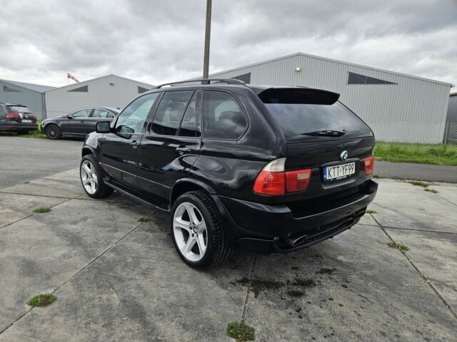 Черный БМВ Х5, объемом двигателя 4.6 л и пробегом 326 тыс. км за 2600 $, фото 4 на Automoto.ua