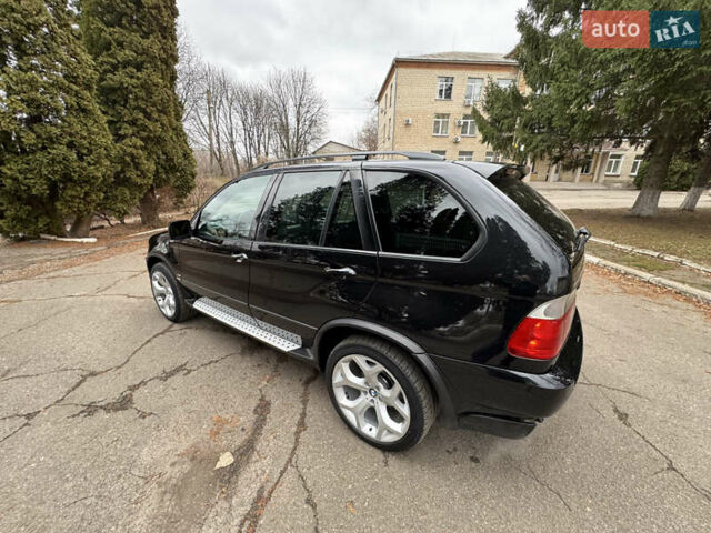 Черный БМВ Х5, объемом двигателя 4.6 л и пробегом 256 тыс. км за 8900 $, фото 15 на Automoto.ua