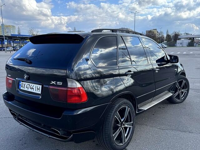 Черный БМВ Х5, объемом двигателя 4.6 л и пробегом 346 тыс. км за 8000 $, фото 5 на Automoto.ua