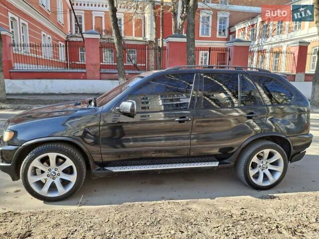Черный БМВ Х5, объемом двигателя 4.4 л и пробегом 314 тыс. км за 8000 $, фото 5 на Automoto.ua