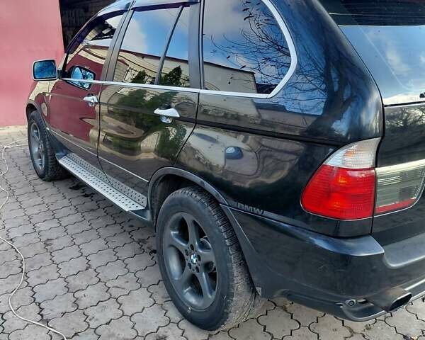 Чорний БМВ Х5, об'ємом двигуна 3 л та пробігом 260 тис. км за 11500 $, фото 19 на Automoto.ua