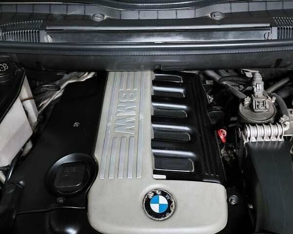 Чорний БМВ Х5, об'ємом двигуна 3 л та пробігом 260 тис. км за 11500 $, фото 4 на Automoto.ua