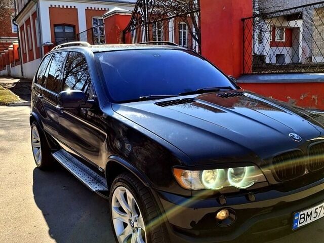 Черный БМВ Х5, объемом двигателя 4.4 л и пробегом 314 тыс. км за 8000 $, фото 13 на Automoto.ua