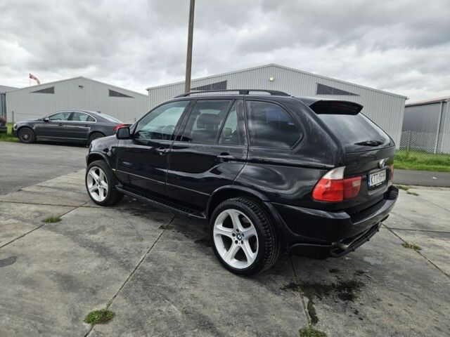 Черный БМВ Х5, объемом двигателя 4.6 л и пробегом 326 тыс. км за 2600 $, фото 5 на Automoto.ua