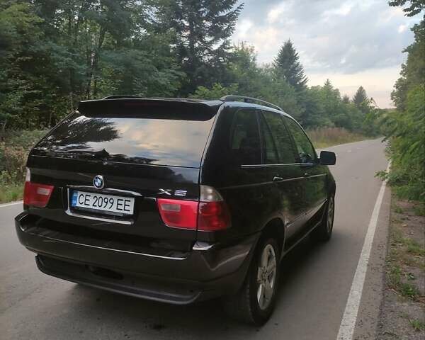 Черный БМВ Х5, объемом двигателя 3 л и пробегом 297 тыс. км за 8750 $, фото 1 на Automoto.ua