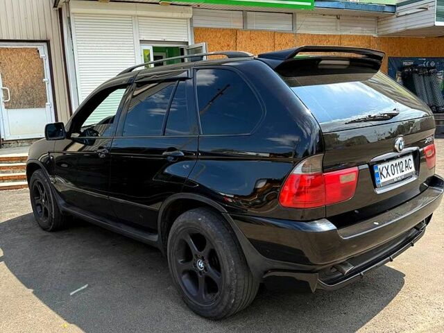 Чорний БМВ Х5, об'ємом двигуна 3 л та пробігом 350 тис. км за 9000 $, фото 4 на Automoto.ua
