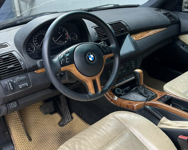 Черный БМВ Х5, объемом двигателя 4.4 л и пробегом 380 тыс. км за 7200 $, фото 6 на Automoto.ua