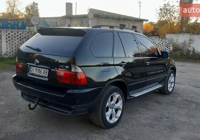 Черный БМВ Х5, объемом двигателя 3 л и пробегом 302 тыс. км за 9200 $, фото 5 на Automoto.ua