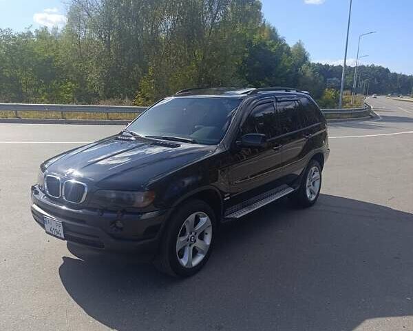 Чорний БМВ Х5, об'ємом двигуна 3 л та пробігом 327 тис. км за 9500 $, фото 4 на Automoto.ua