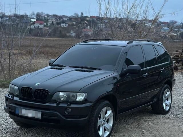 Чорний БМВ Х5, об'ємом двигуна 3 л та пробігом 475 тис. км за 8499 $, фото 1 на Automoto.ua