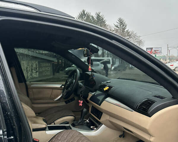 Черный БМВ Х5, объемом двигателя 2.9 л и пробегом 187 тыс. км за 12000 $, фото 12 на Automoto.ua