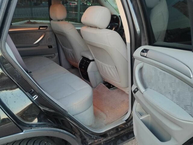 Черный БМВ Х5, объемом двигателя 3 л и пробегом 310 тыс. км за 4800 $, фото 4 на Automoto.ua