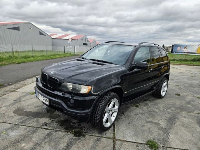 Черный БМВ Х5, объемом двигателя 4.6 л и пробегом 326 тыс. км за 2600 $, фото 2 на Automoto.ua