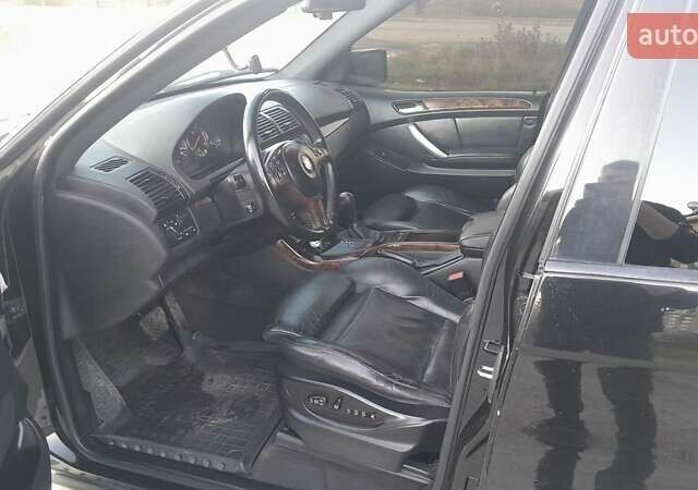 Черный БМВ Х5, объемом двигателя 3 л и пробегом 302 тыс. км за 9200 $, фото 17 на Automoto.ua