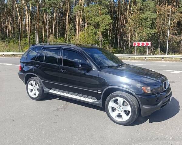 Чорний БМВ Х5, об'ємом двигуна 3 л та пробігом 327 тис. км за 9500 $, фото 2 на Automoto.ua