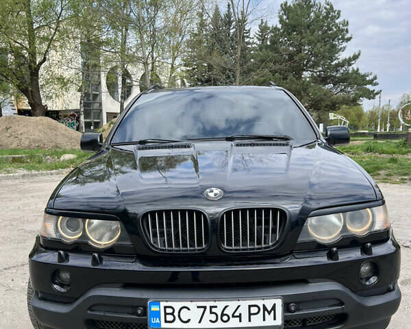 Черный БМВ Х5, объемом двигателя 4.4 л и пробегом 380 тыс. км за 7200 $, фото 1 на Automoto.ua