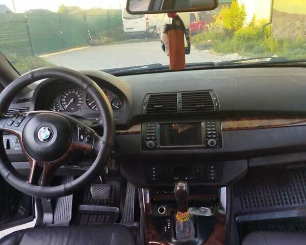 Черный БМВ Х5, объемом двигателя 2.93 л и пробегом 400 тыс. км за 9200 $, фото 1 на Automoto.ua