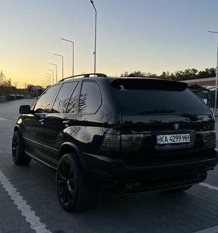 Черный БМВ Х5, объемом двигателя 4.4 л и пробегом 295 тыс. км за 8000 $, фото 1 на Automoto.ua
