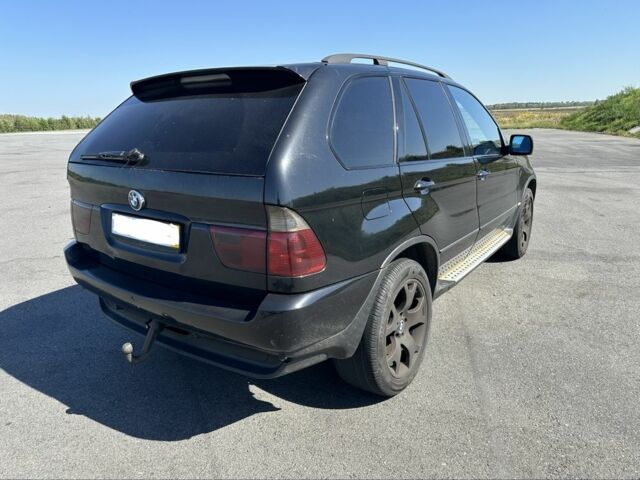 Чорний БМВ Х5, об'ємом двигуна 3 л та пробігом 440 тис. км за 4900 $, фото 2 на Automoto.ua