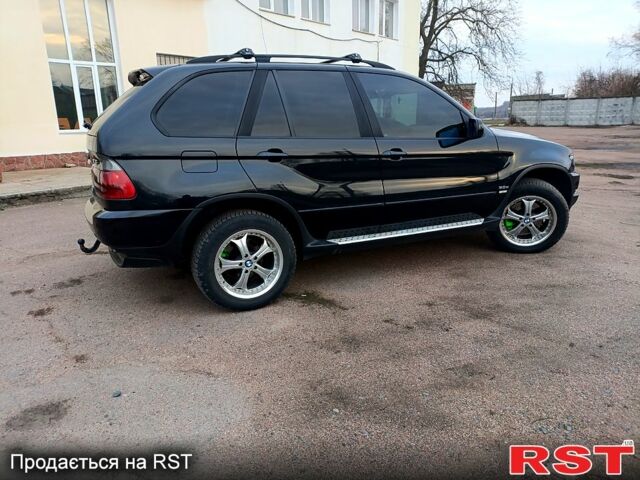 Черный БМВ Х5, объемом двигателя 2.9 л и пробегом 323 тыс. км за 12000 $, фото 8 на Automoto.ua