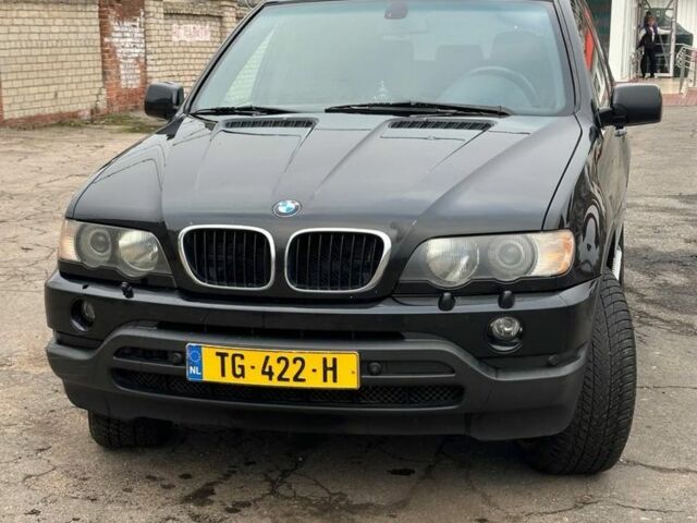 Черный БМВ Х5, объемом двигателя 3 л и пробегом 300 тыс. км за 5700 $, фото 5 на Automoto.ua