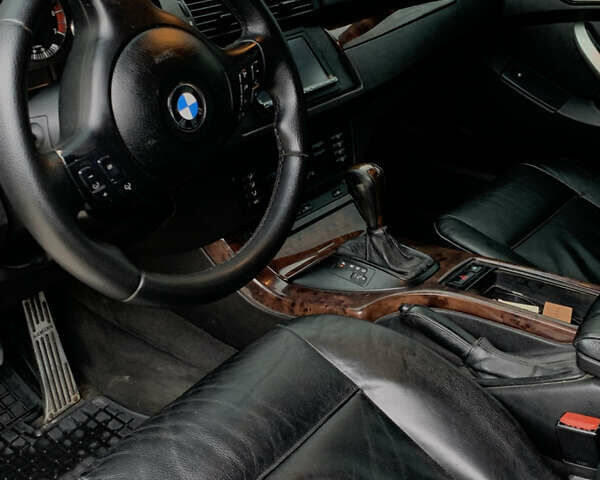 Черный БМВ Х5, объемом двигателя 4.4 л и пробегом 370 тыс. км за 6999 $, фото 28 на Automoto.ua