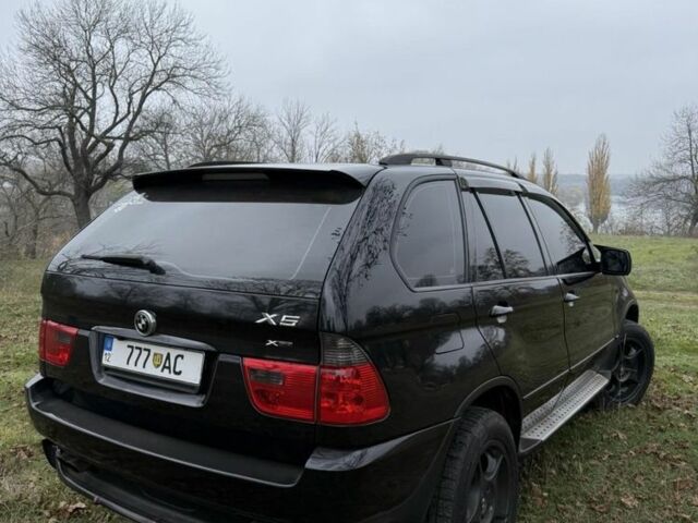 Черный БМВ Х5, объемом двигателя 3 л и пробегом 404 тыс. км за 9500 $, фото 3 на Automoto.ua
